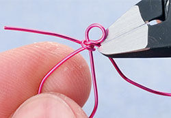 Wire cutters trimming loose ends